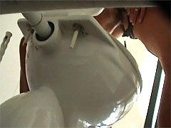 Watch sexy bikini girls squat over a spycammed pan