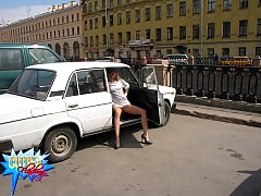 Shameless blonde bitch rubs her pussy in public